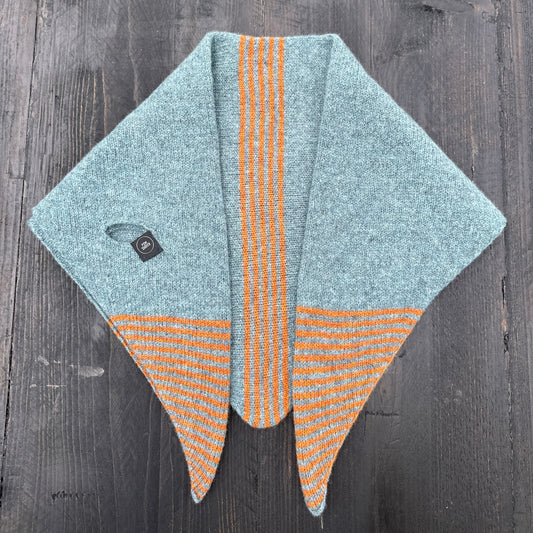 Merino lambswool double layer striped, multicoloured, caspian blue and rust pull through triangle scarf / kerchief / neckerchief for women, men, unisex flat on a dark wooden table.