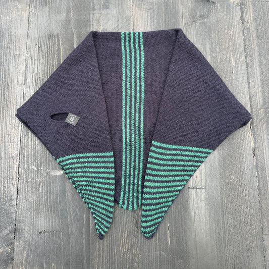 Merino lambswool double layer striped, multicoloured, cossack green and navy blue pull through triangle scarf / kerchief / neckerchief for women, men, unisex laying flat on a wooden table.