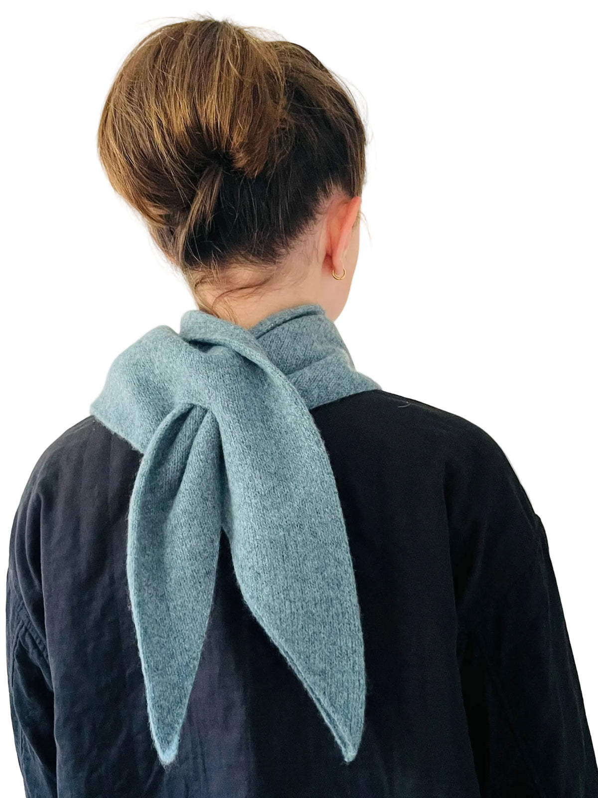 Caspian Blue Triangle Scarf, merino wool, worn by a model, a closer view