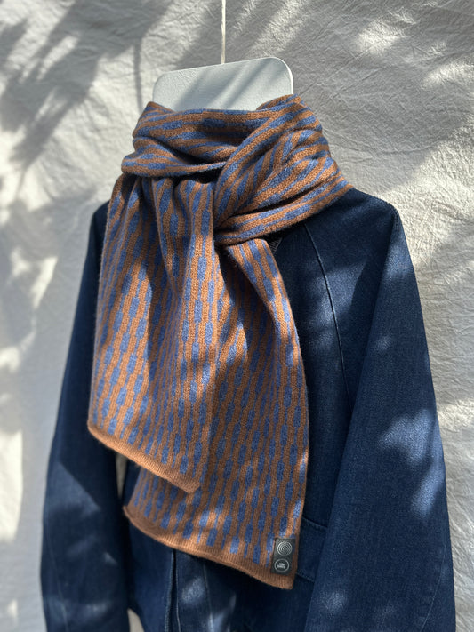 Rhapsody Blue and Spaniel Brown Cascade Scarf, lambswool, draped over a denim jacket